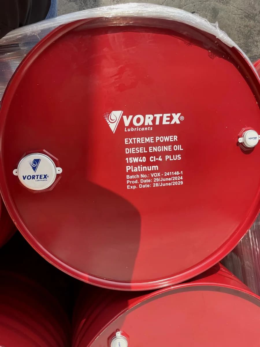 Close view of a red Vortex drum lid